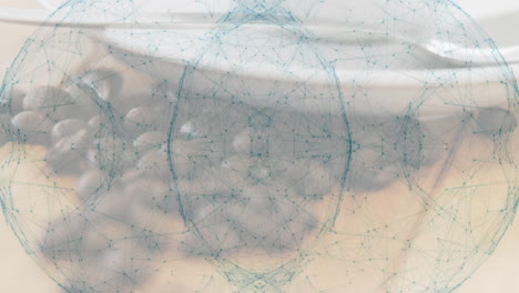 roasted coffee beans resting on wooden tabletop while teal network overlay linking nodes