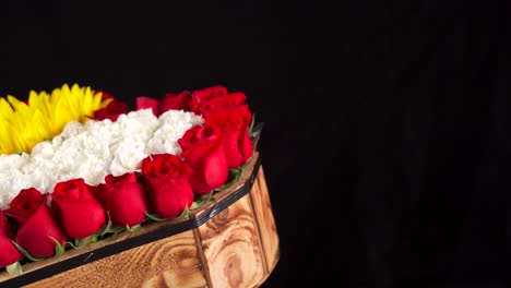 sunflower and roses heath wood box arrangement spinning in black background slider