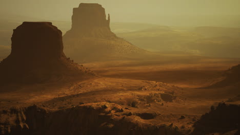 desert sunset in monument valley highlights stunning rock formations