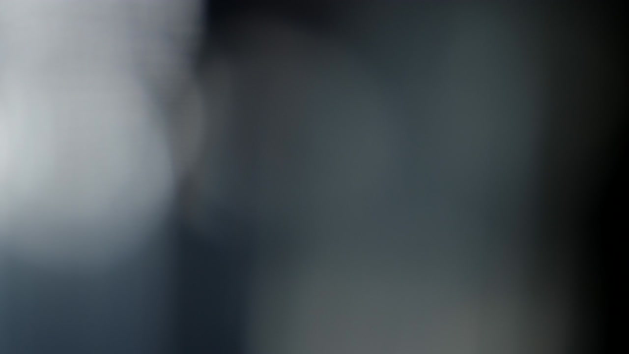 Abstract light leaks on black background.