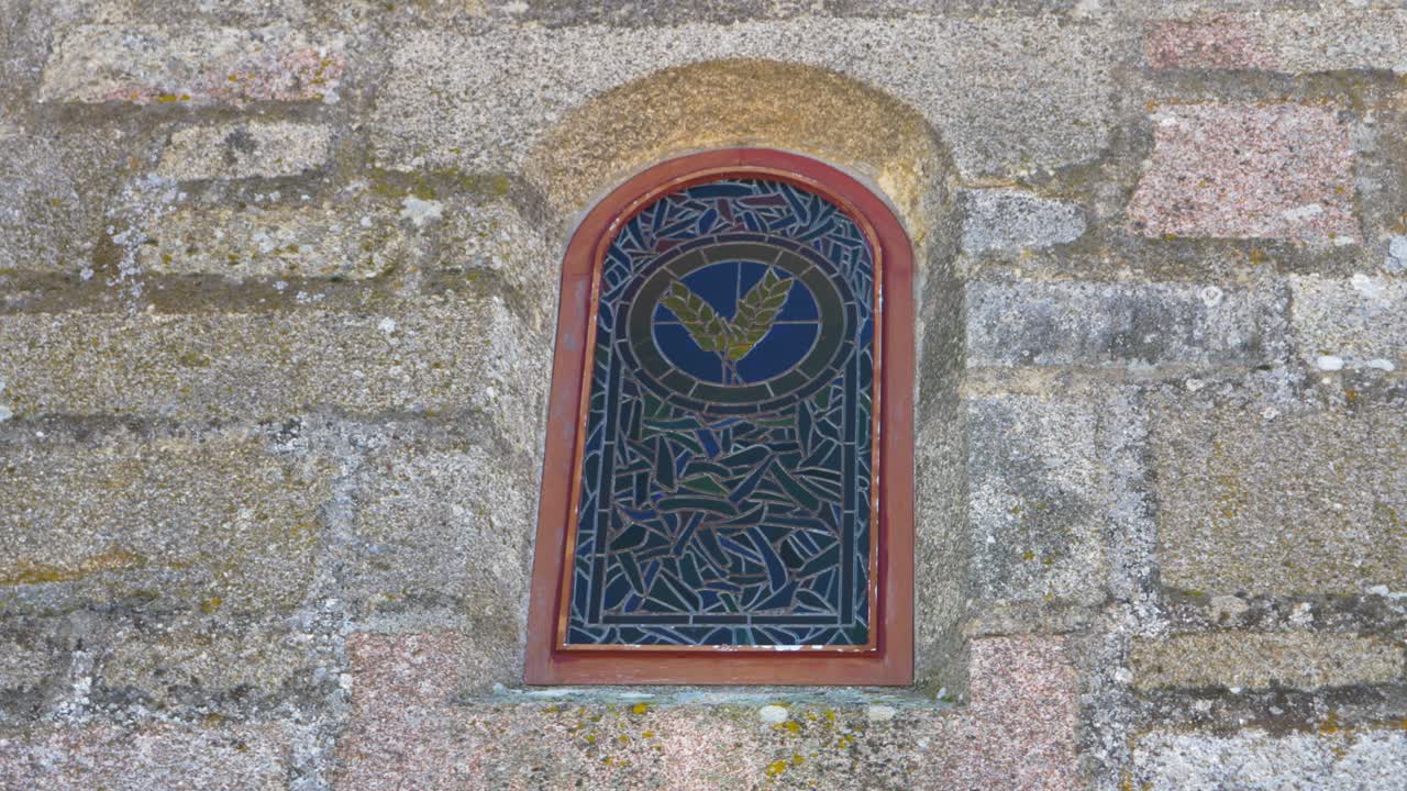 Window detail at Santa María de Parada de Outeiro church in Vilar de Santos, Ourense, Spain