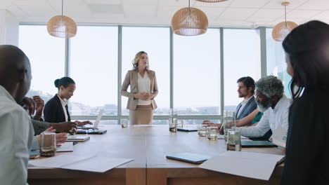 beautiful business woman team leader discussing creative ideas with shareholders briefing colleagues sharing company development strategy in office boardroom meeting 4k