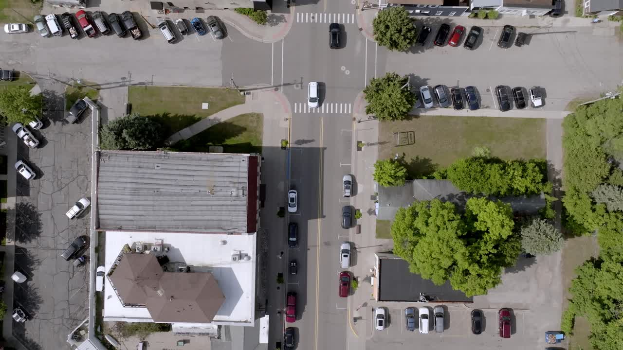 Downtown Pentwater, Michigan with drone video overhead moving forward.