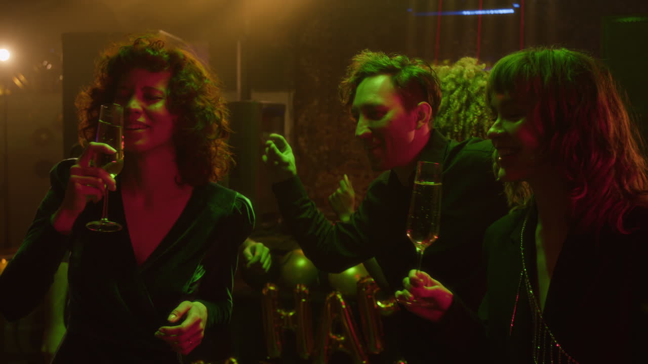 People celebrating at a party with champagne