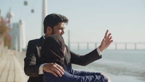 Arabic-Middle-East-couple-having-walk-along-quay