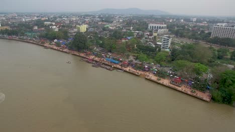 aerial shot of surat thani, river and city surat thani province, thailand