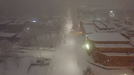 Heavy-snow-winter-weather-Montreal-Quebec-Canada-snowy-covered-street-buildings