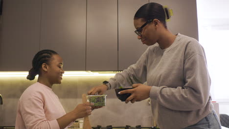 women preparing a salad