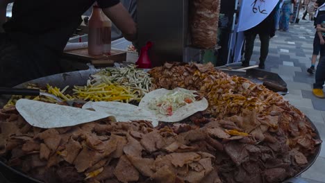 street food vendor preparing döner kebab