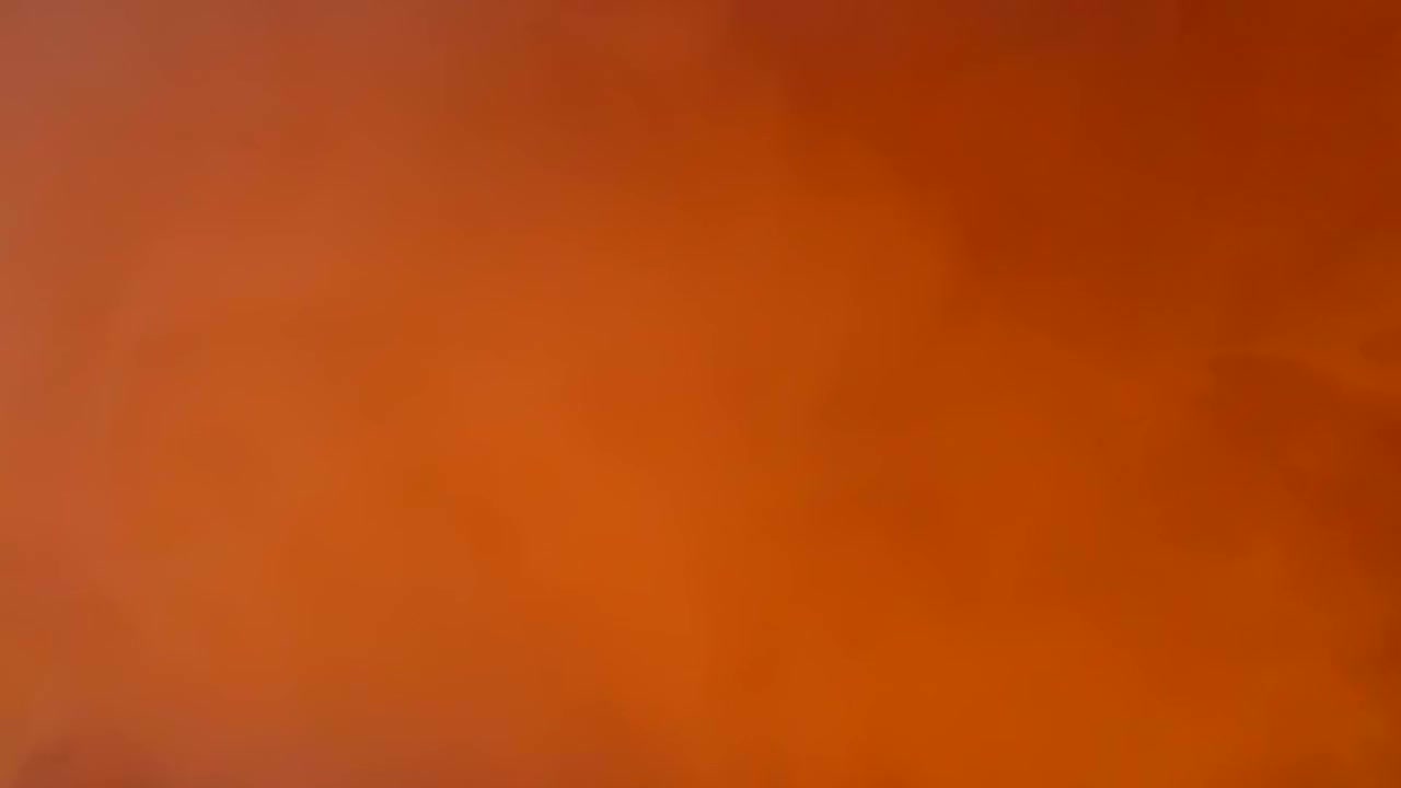 fondo abstracto de movimiento de niebla y niebla en naranja y amarillo