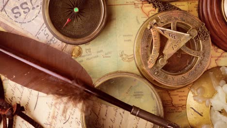 vintage style travel and adventure. vintage old compass and other vintage items on the table.