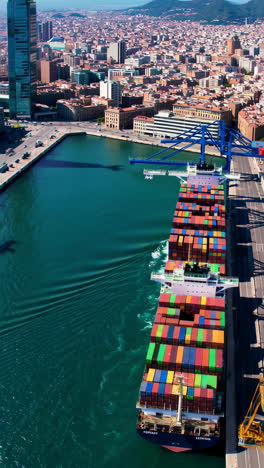 container ship at a port in barcelona, spain