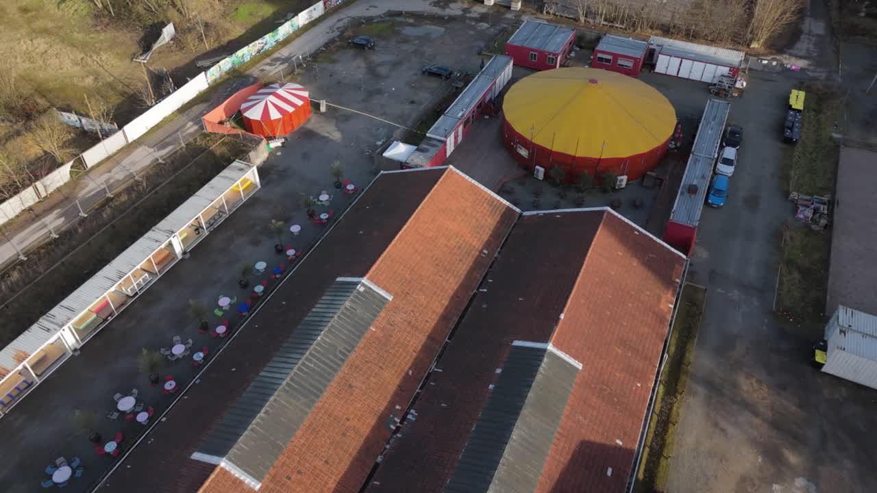 Quartier Fort d'Aubervilliers, industrial buildings, urban space in suburban Paris, France. Aerial top-down forward