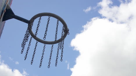 footage of a chain hoop in a basketball field