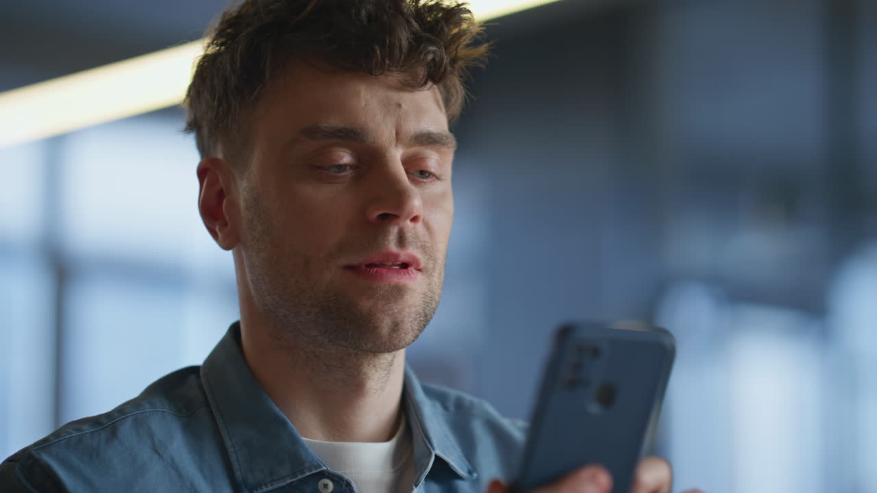 Entrepreneur browsing smartphone application in office closeup. Employee typing