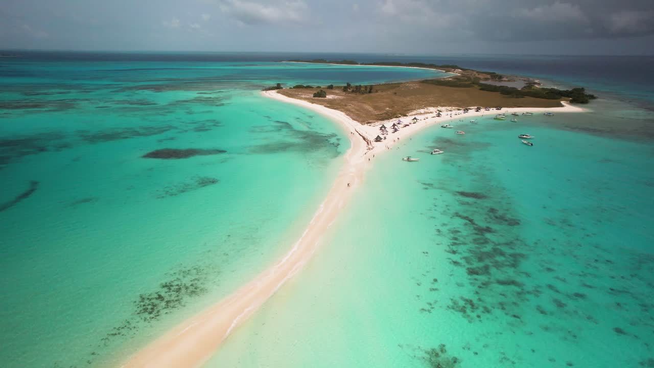 Drone shot couple standing together best tropical sandbar, Honeymoon concept. Los Roques