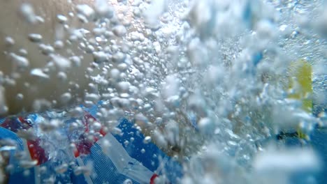 underwater air bubbles making people relax at thermal centre swimming pool