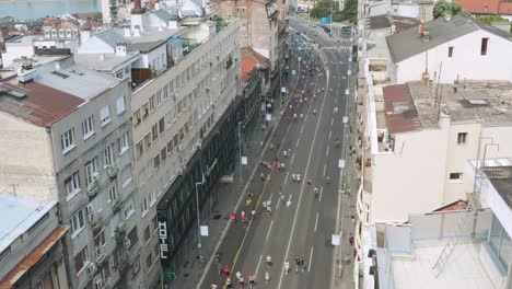 aerial: belgrade marathon runners in city centre