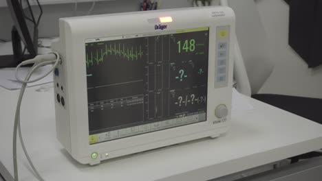 a drager vista being used to monitor a patient's current health, illustrative editorial