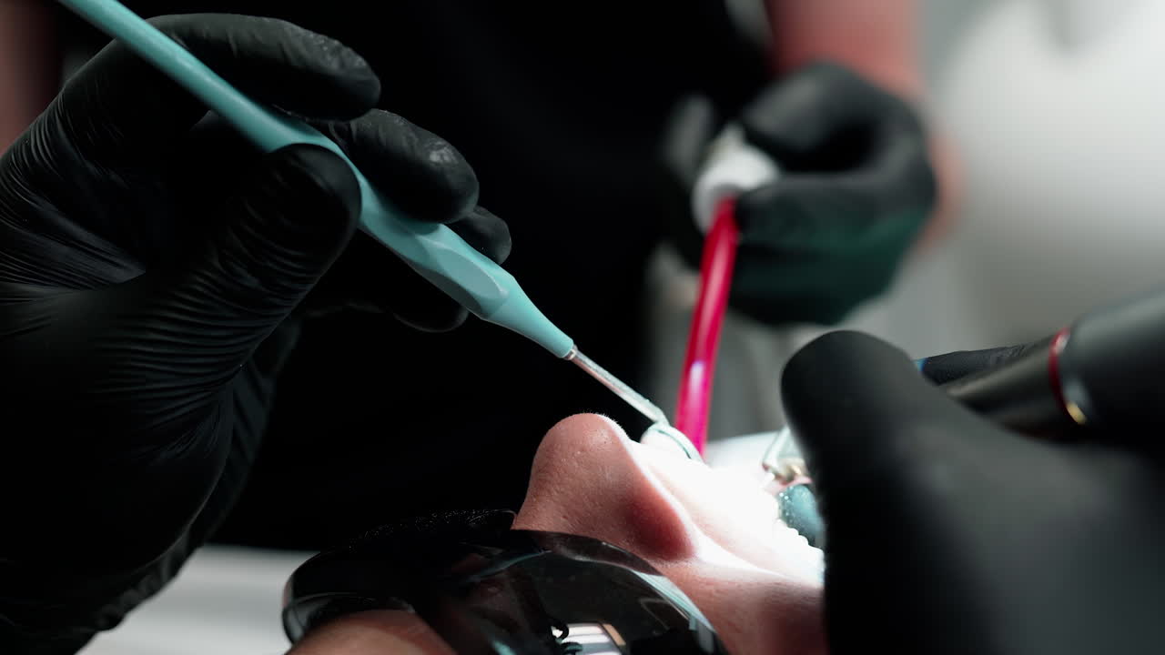 Dentist clinic with patient. Patient at the dentist office during treatment