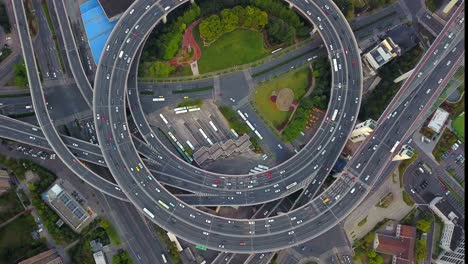 aerial view of roundabout of nanpu bridge, shanghai downtown, china. financial district and business centers in smart city in asia. top view of skyscraper and high-rise buildings.