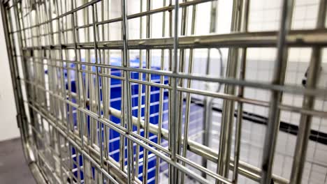 intricate design of metallic trolley cage in industrial environment