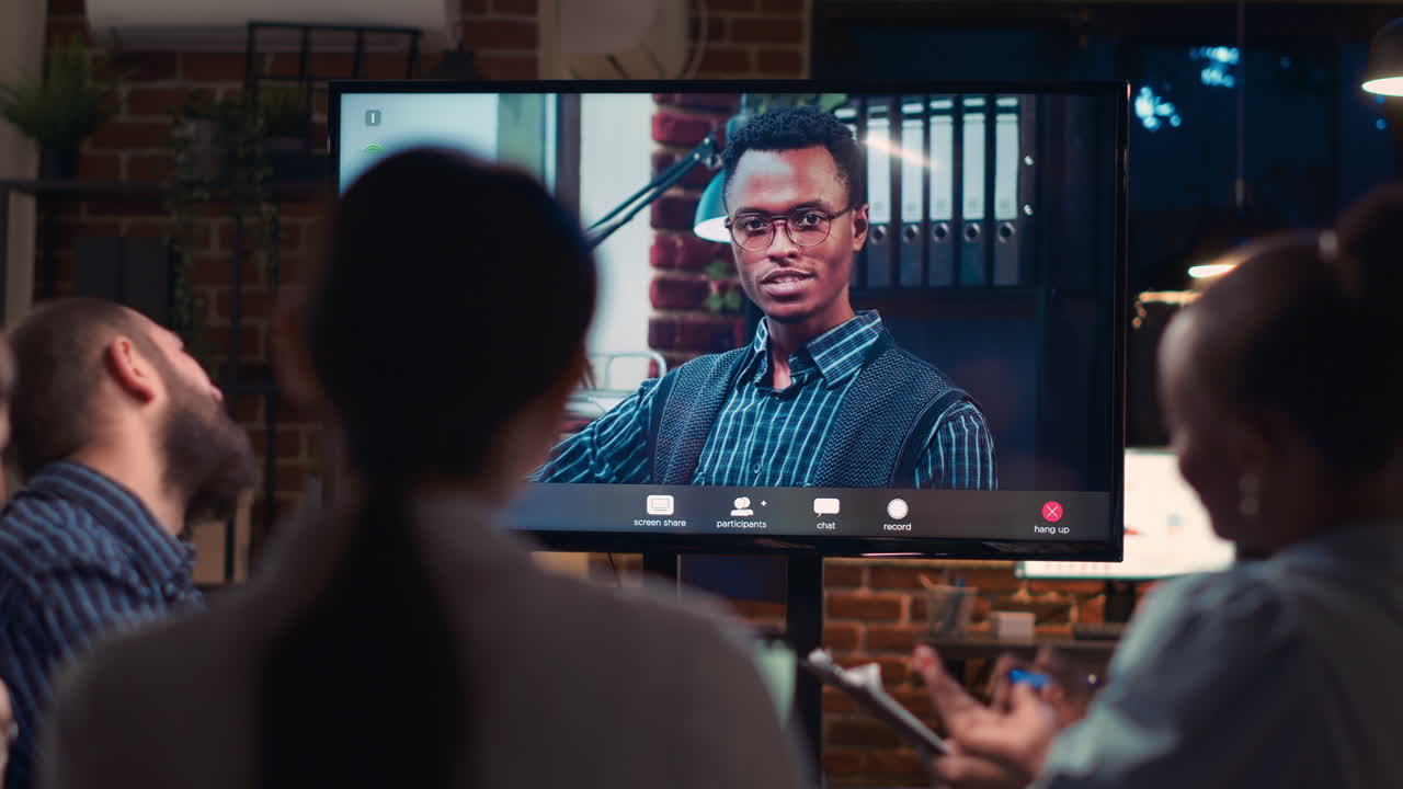 African american remote team leader speaking in videocall