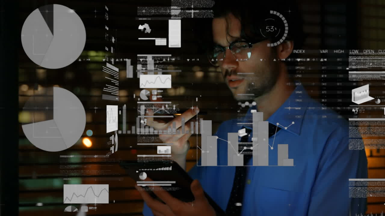 Animation of data processing over businessman using tablet