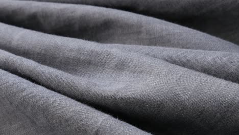 surface of silky fine gray jeans close-up details slow tilt 3840x2160 ultrahd footage - detailed gray shirt or pants denim texture background 4k 2160p 30fps uhd tilting video