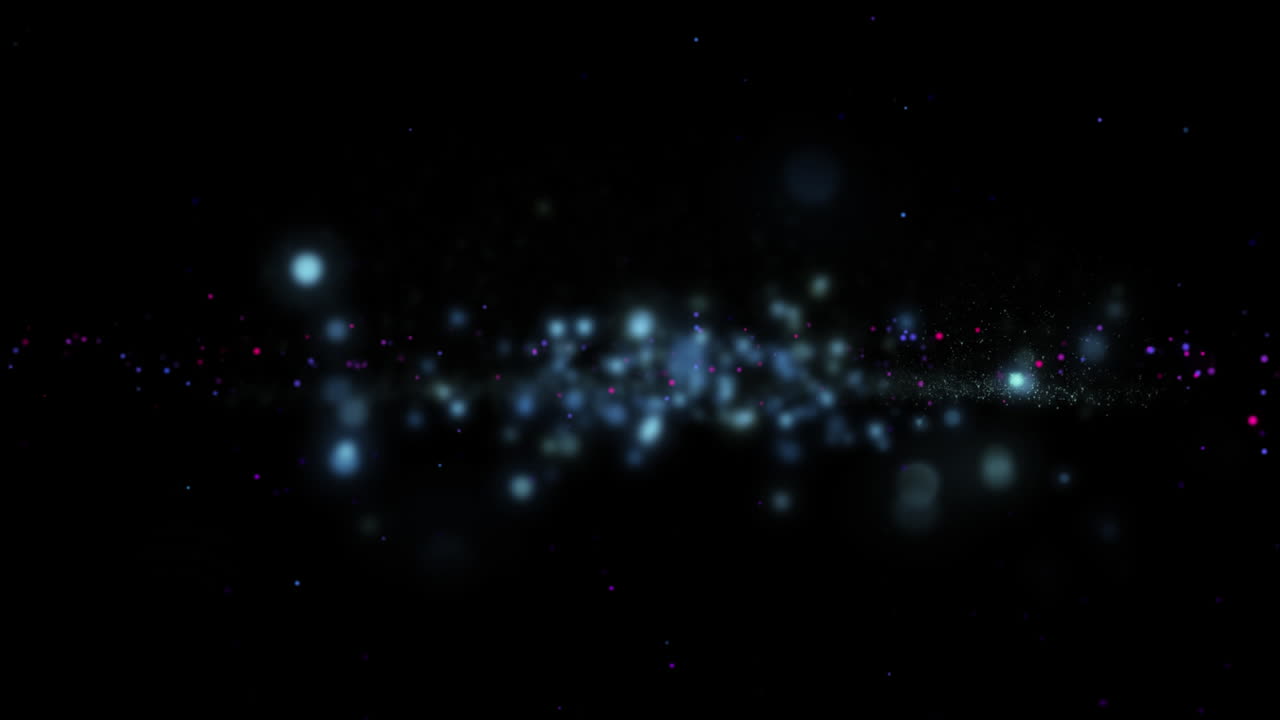Animation of sparkling blue particles and smoke moving on black background