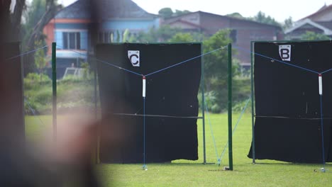 show archery target point in contest event, dramatic camera shaky concept