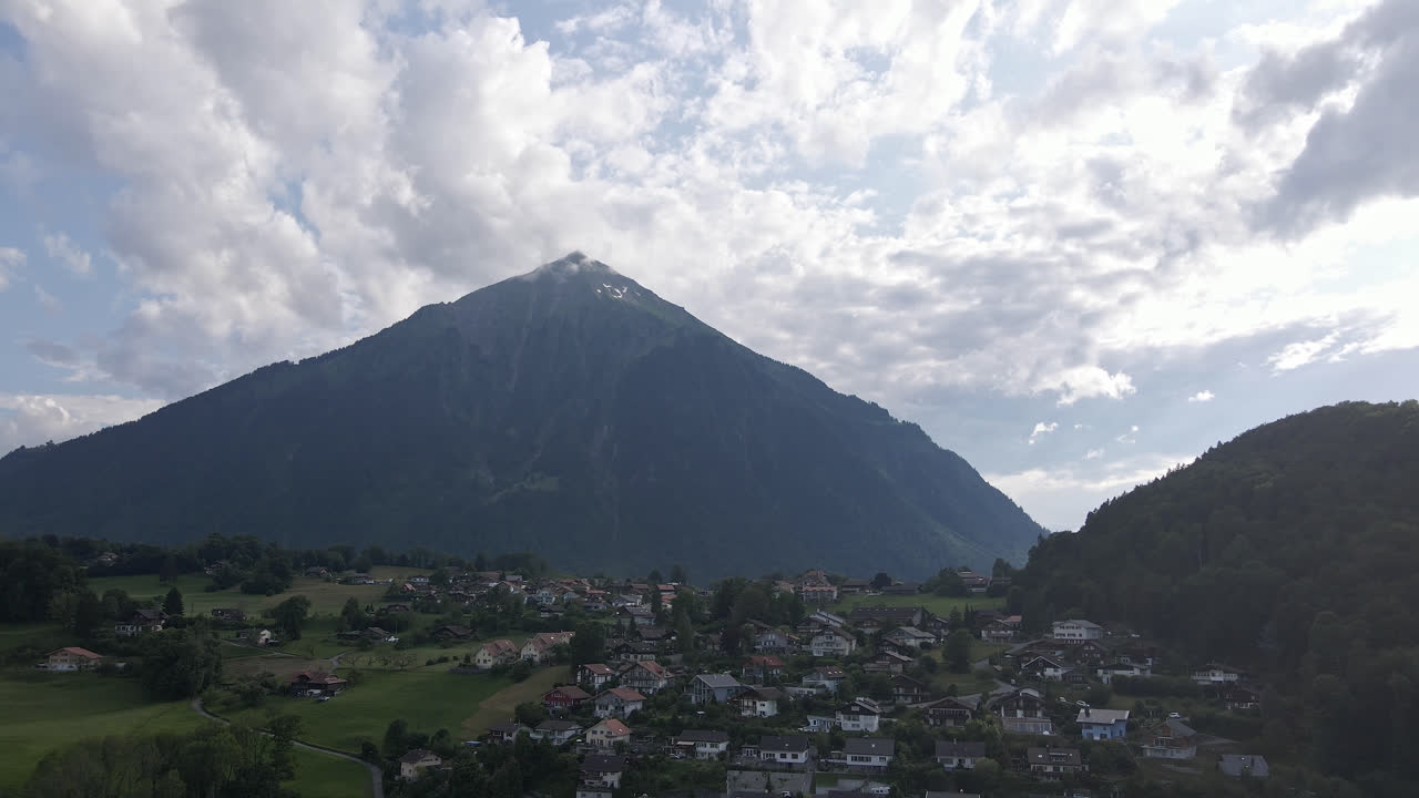 Swiss Village with Huge Mountain in Background 4KFormat: MP4 | 4K 25p | 8-bit | D-Cinelike | Graded