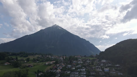 swiss village with huge mountain in background 4kformat: mp4 | 4k 25p | 8-bit | d-cinelike | graded