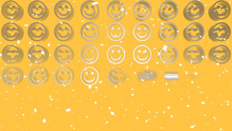 animación de confeti blanco cayendo sobre filas de emoticones de caras sonrientes de metal sobre un fondo amarillo