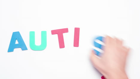 autism spelled out in colourful letters