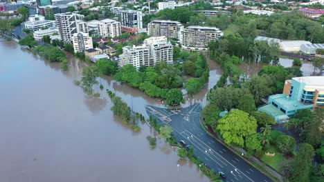 Side-on-drone-view-of-flooded-road