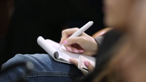 people hands making notes. business people hands over papers making notes at seminar