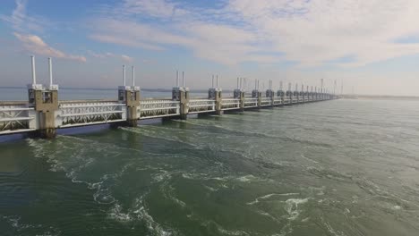 aerial: the famous storm surge barrier in the south west of the netherlands