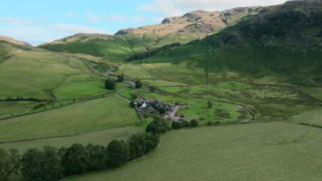 farm at foot of blea tarn mountain pass in summer. great langdale, lake district, cumbria, uk