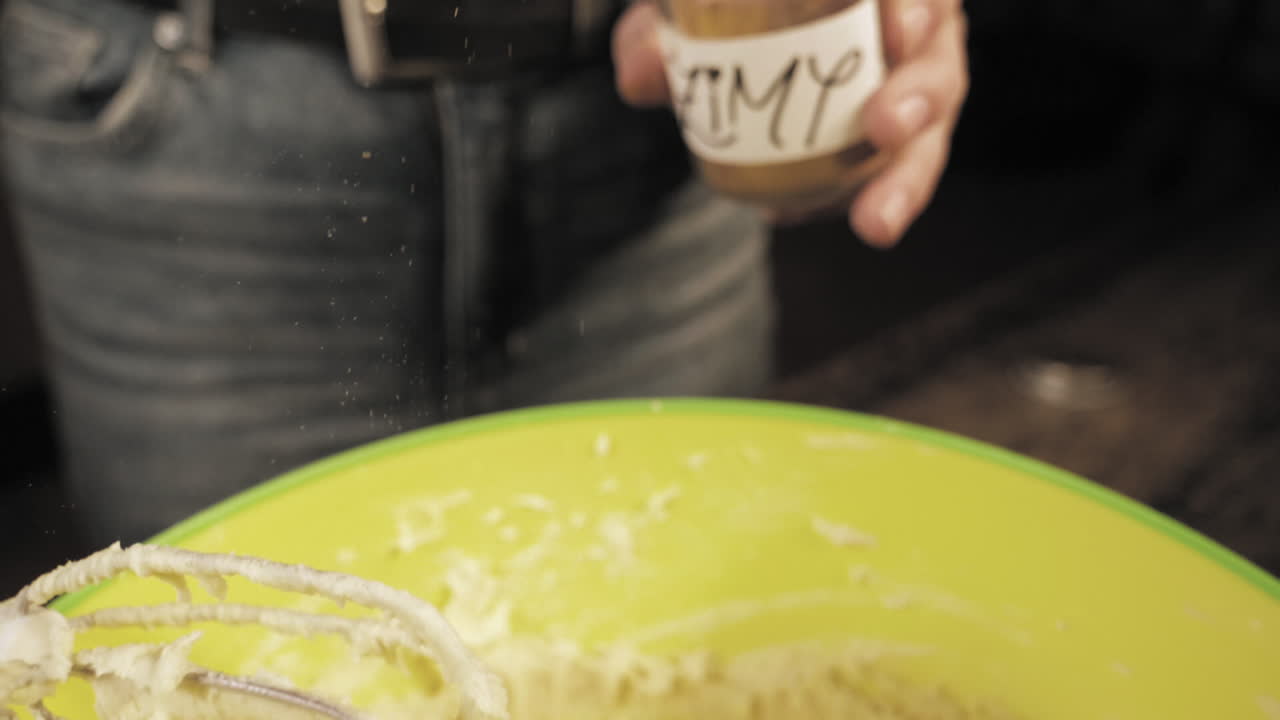 Slow Motion of female hands preparing chocolate cookies.
