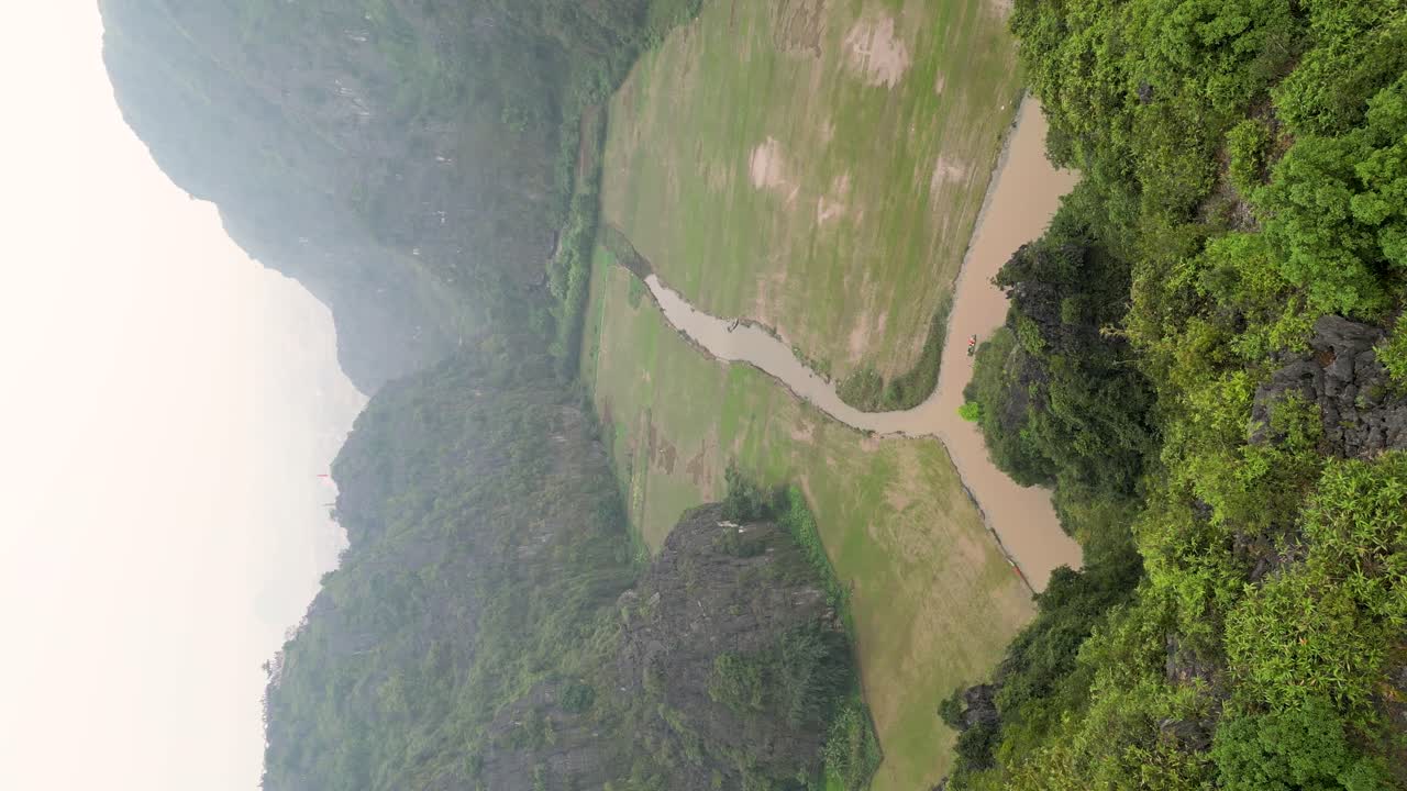 Aerial View of a Lush Green Valley with a River