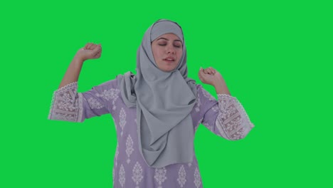 sleepy and tired muslim woman green screen