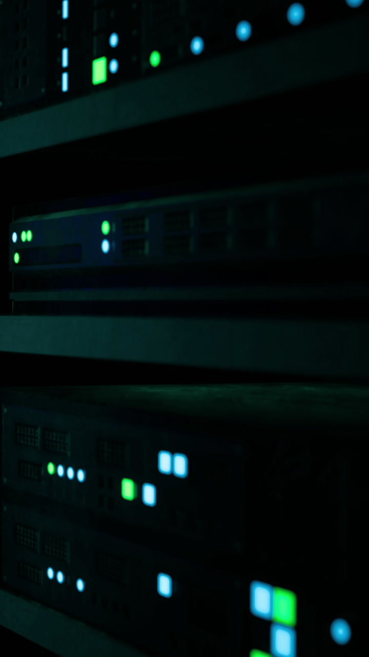 Bright lights flicker from server racks in a dark tech environment