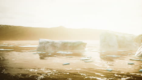 close-up of iceberg on black sand shore