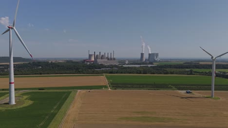 wind farm near rwe power ag kraftwerk neurath power station in germany