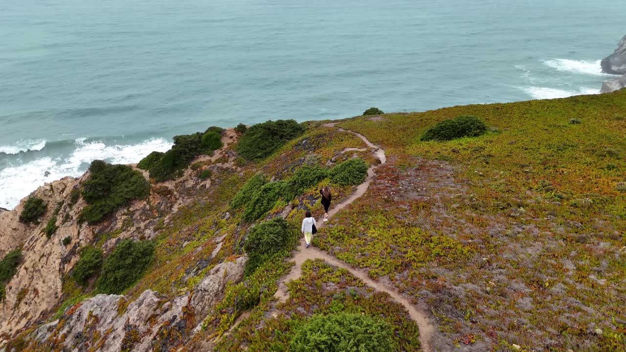 Coastal trail with people