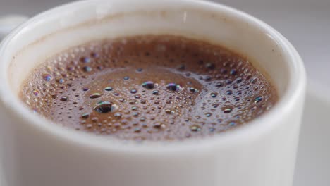 turkish coffee in a white cup