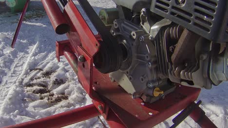 gasoline engine running a grain auger