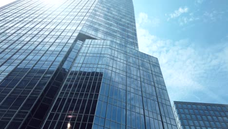 Low-angle-POV-driving-in-Denver-downtown