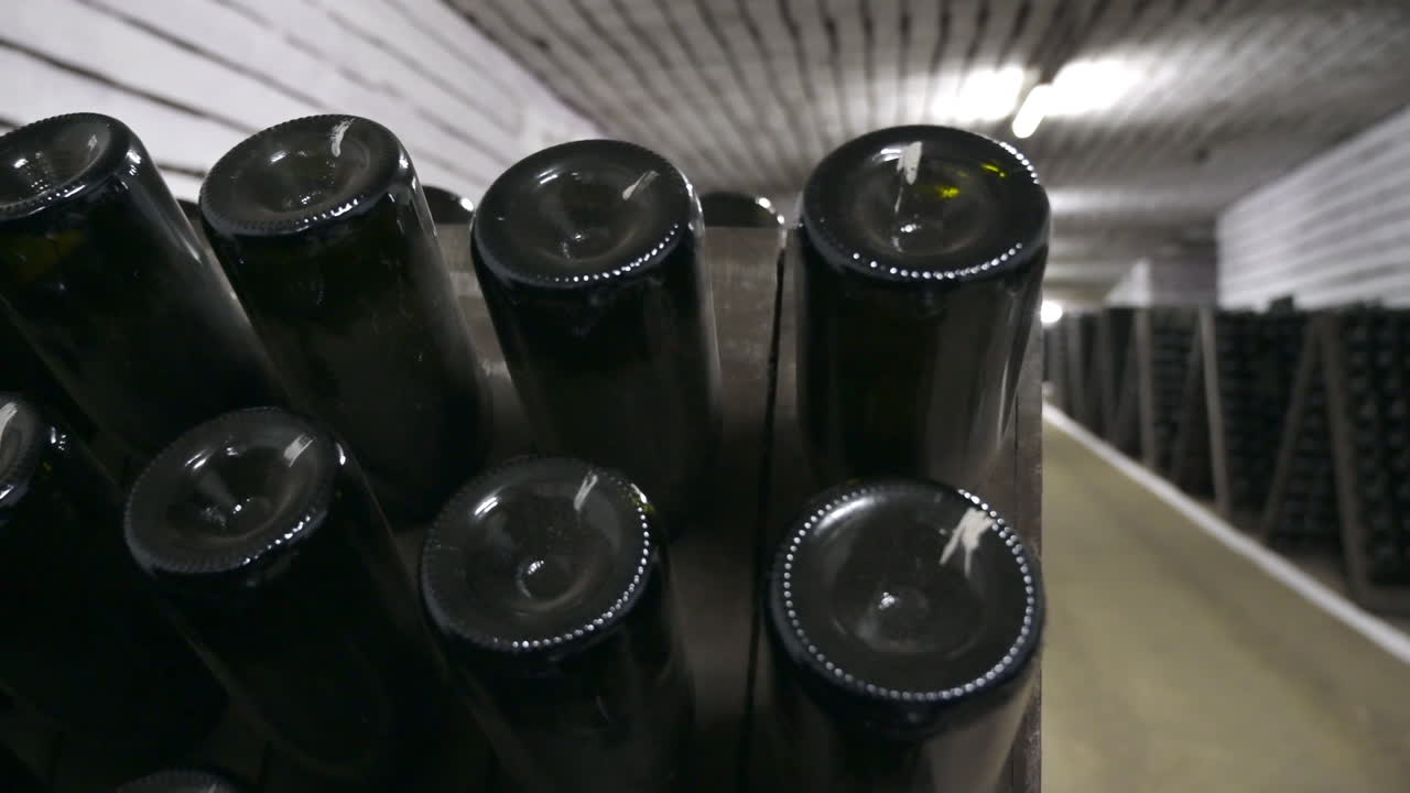 Wine bottles in a winery cellar underground